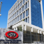 Dev holding oyakin oldu QQaZuZn9